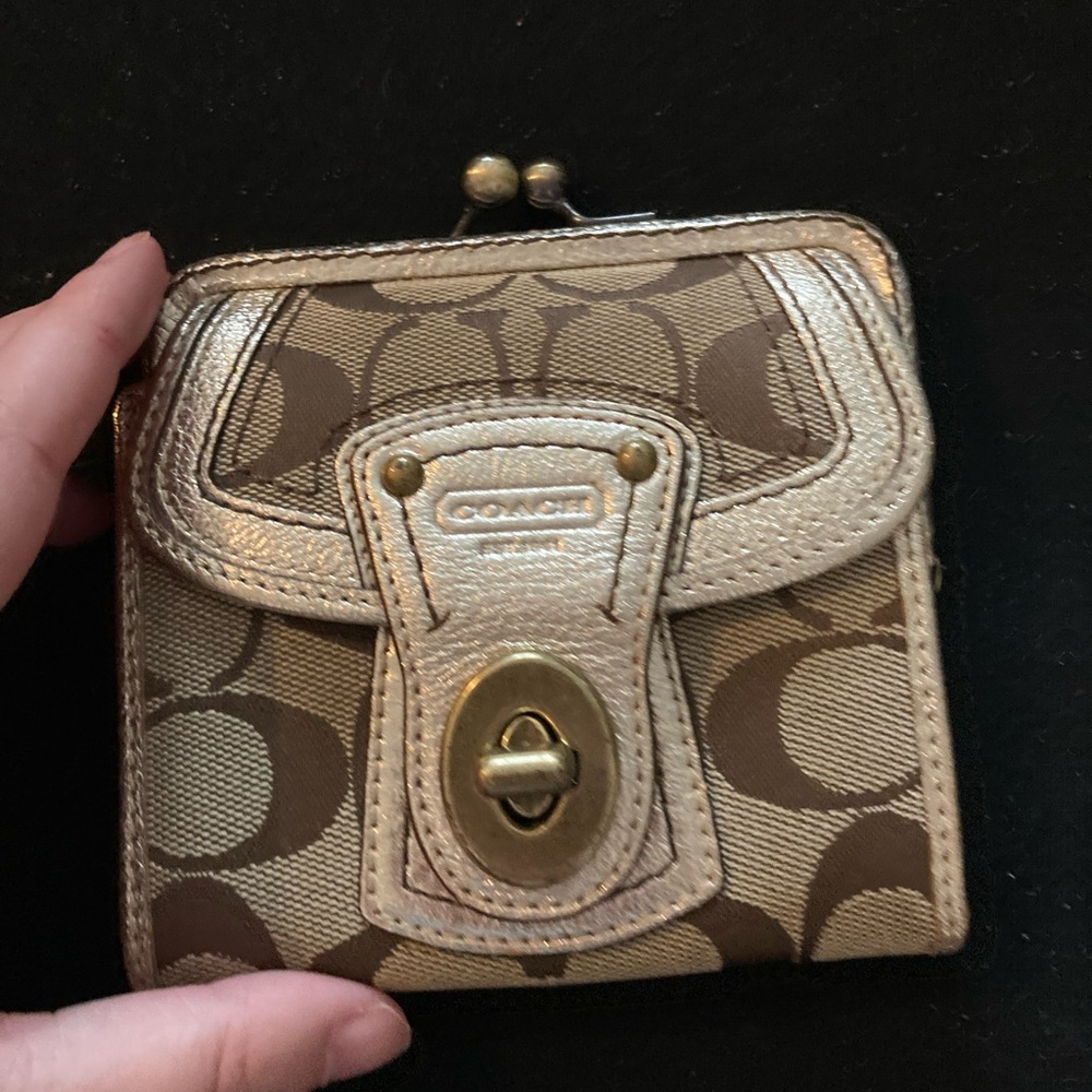 Tan and cold coach wallet